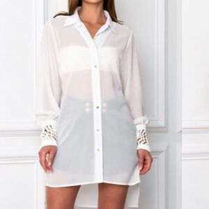 Brand new. Stunning tunic/cover up